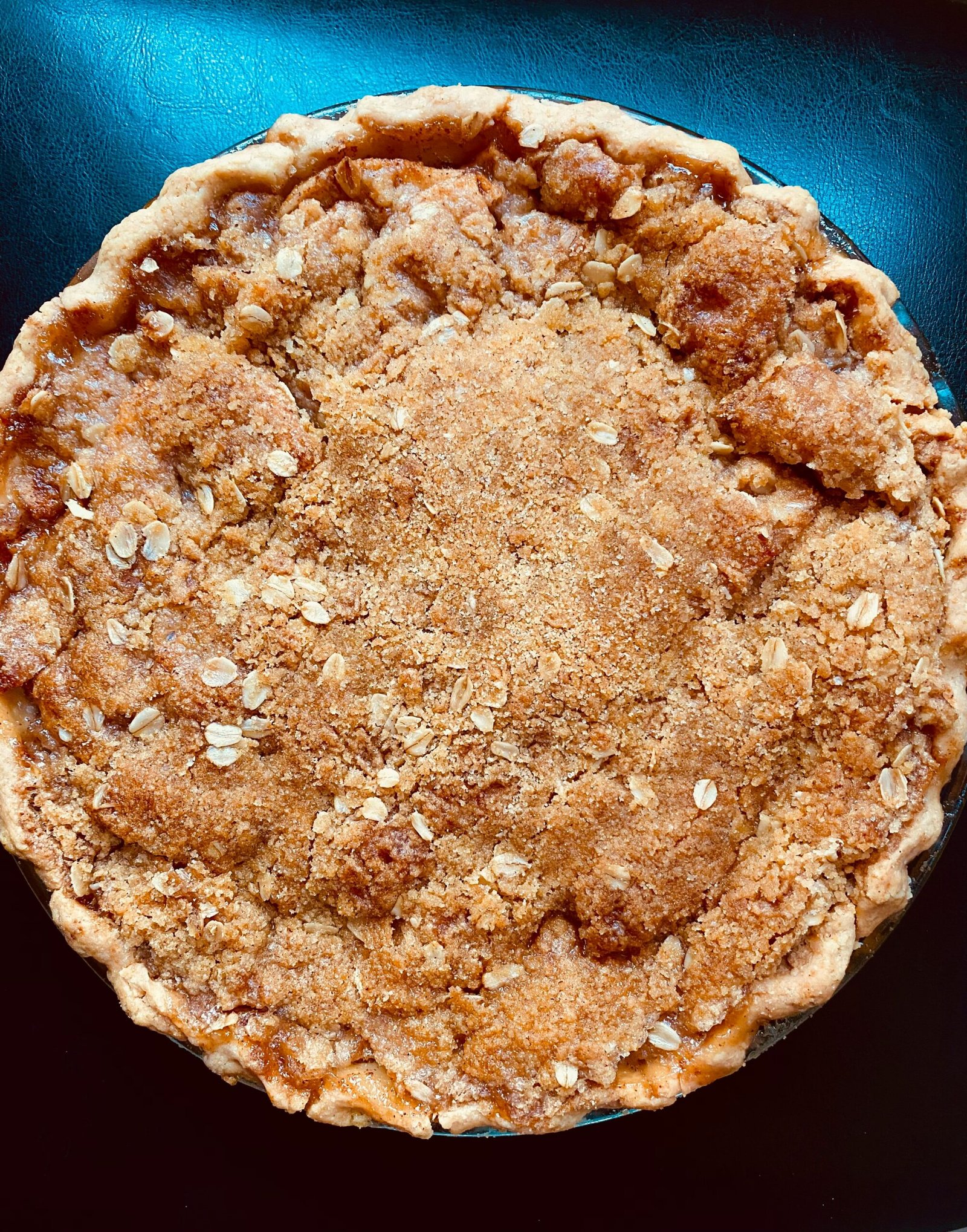 a brown pastry with white powder on it