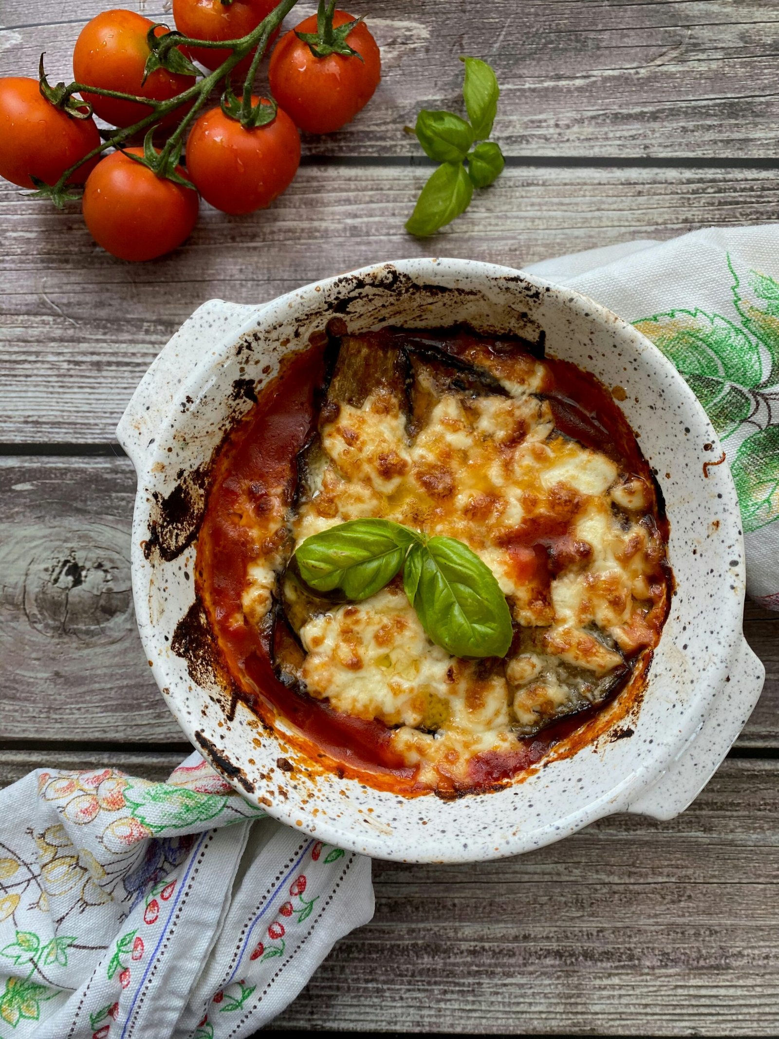 a dish of food on a wooden table